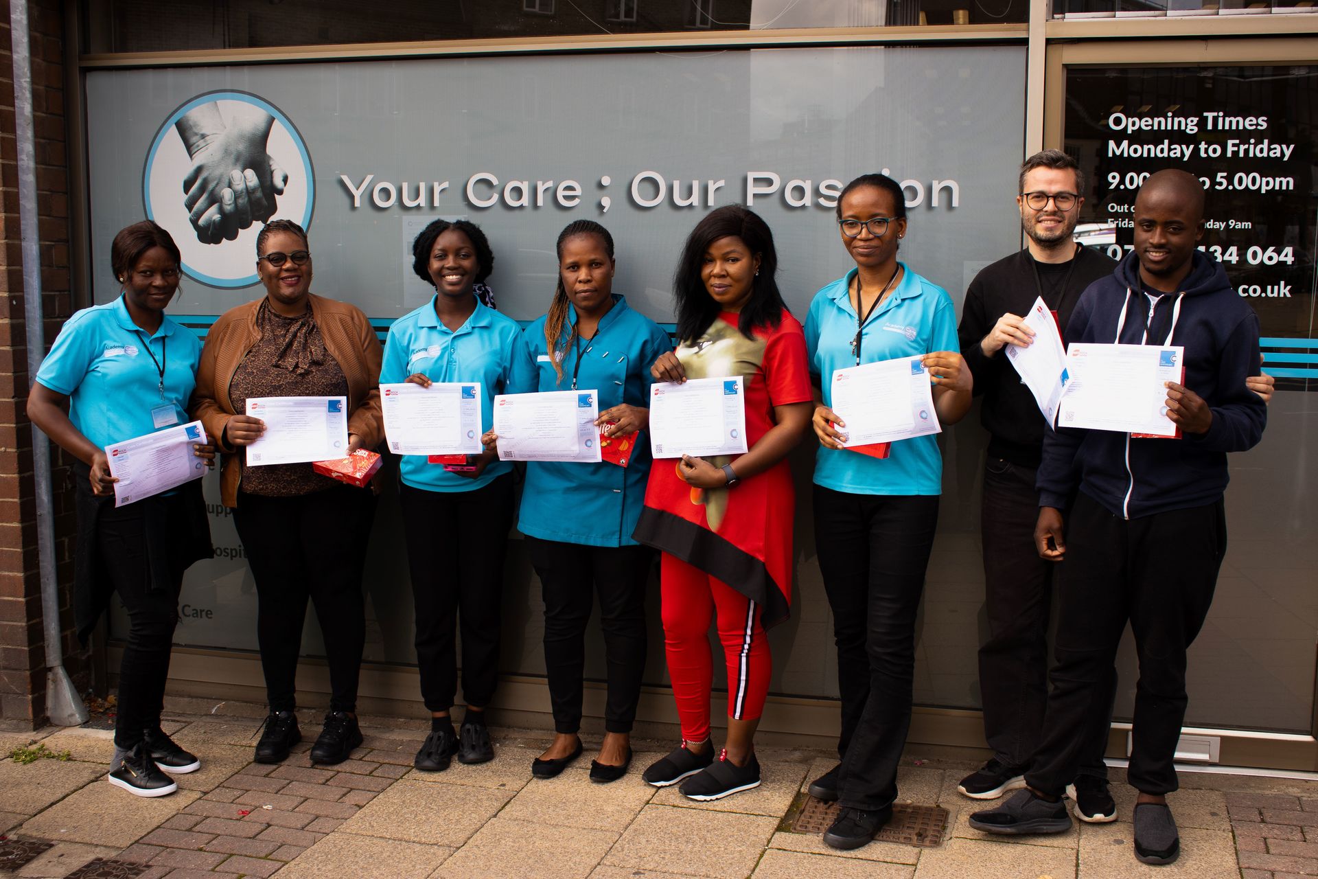 Group photo of people receiving care certificate
